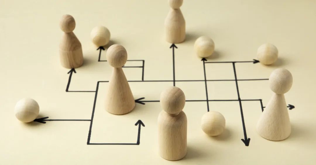 high-angle-wooden-pawns-arrangement.jpg